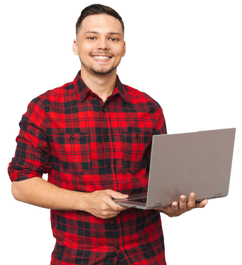Portrait of a young man in plaid shirt holding laptop