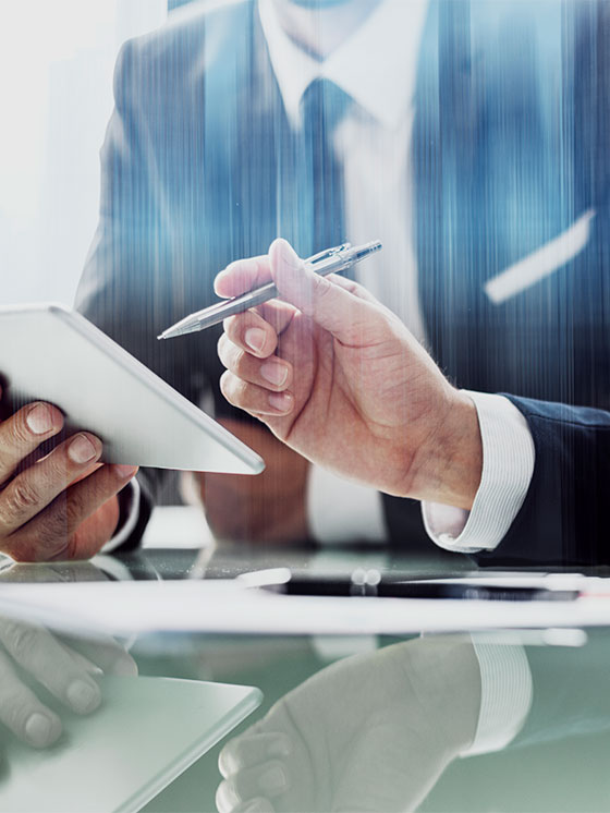 corporate-businessmen-working-on-tablet-at-office